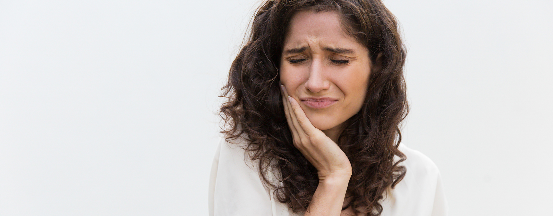 Frustrated unhappy woman suffering from toothache